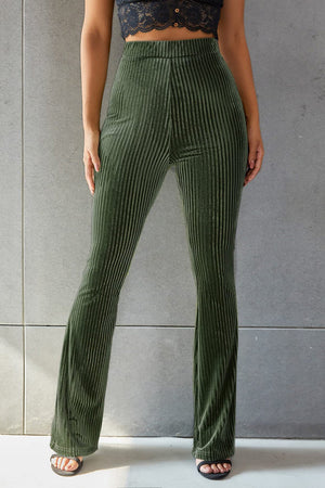 Ribbed velvet palazzo trousers in Army Green, featuring a flared leg and high waist.