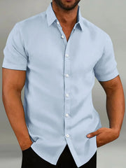 Light blue linen-blend short-sleeve button-down shirt with tailored fit.