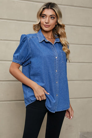 Royal blue denim shirt with puff sleeves, collared neckline, and button front.