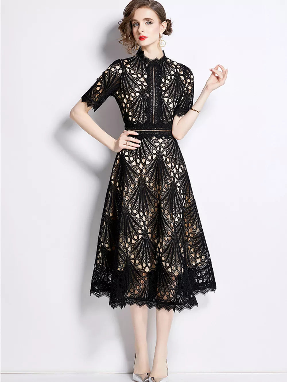 Elegant Black lace midi dress with delicate sleeves and a-line cut.