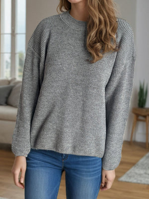 Textured ribbed knit oversized sweater in gray with crew neck and long sleeves.
