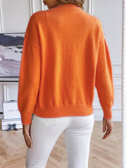 Tangerine button-down cardigan with crew neck and ribbed cuffs and hem