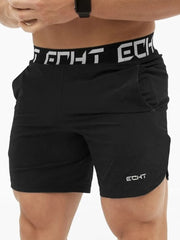 Black performance training shorts with branded waistband and logo detail