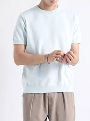 Men's light blue knitted t-shirt with short sleeves and crew neck.