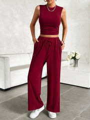 Burgundy ribbed crop top and wide-leg lounge pants with drawstring waist and pockets.
