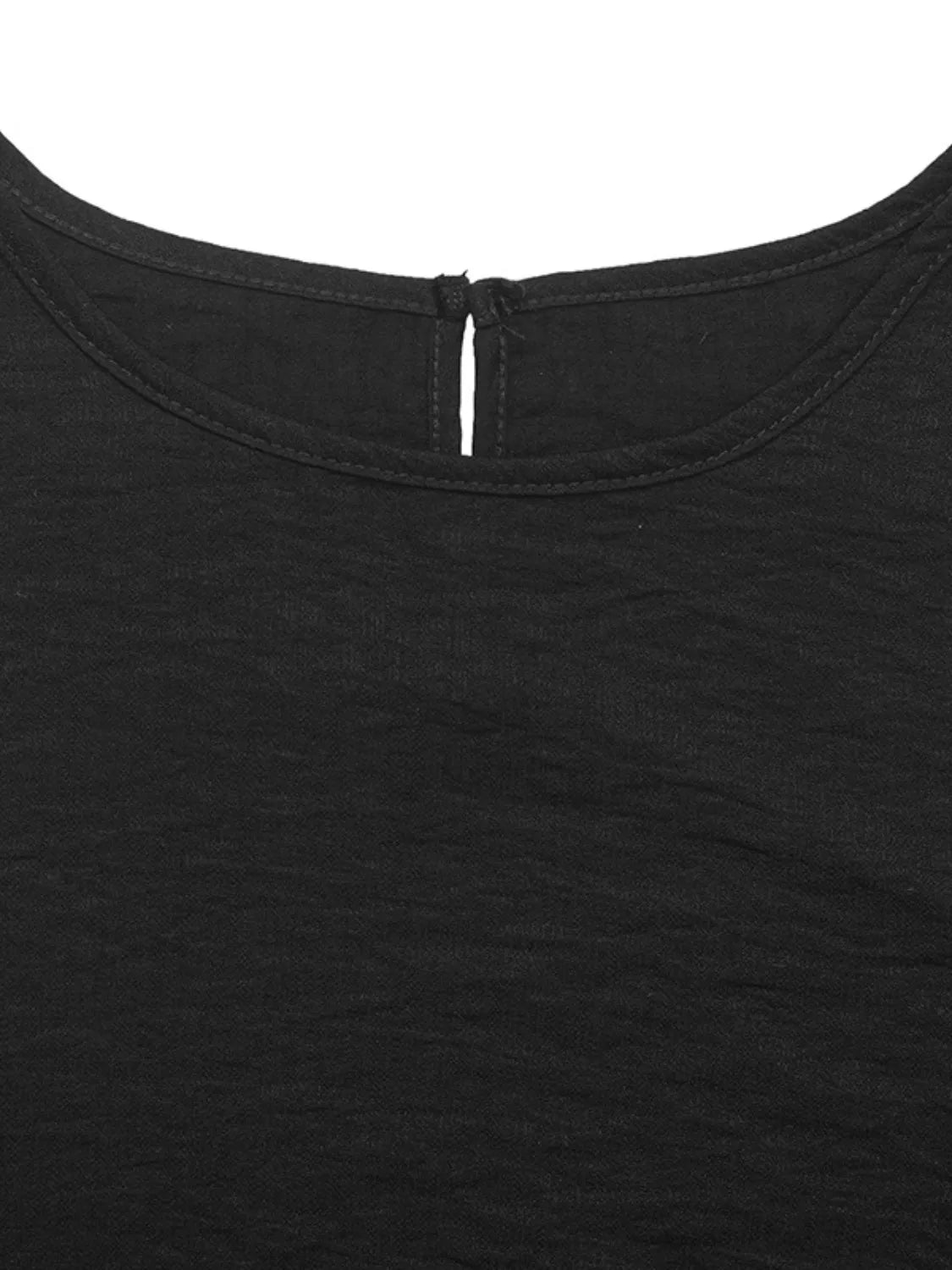 Black crop top set with a keyhole neckline and button closure detail
