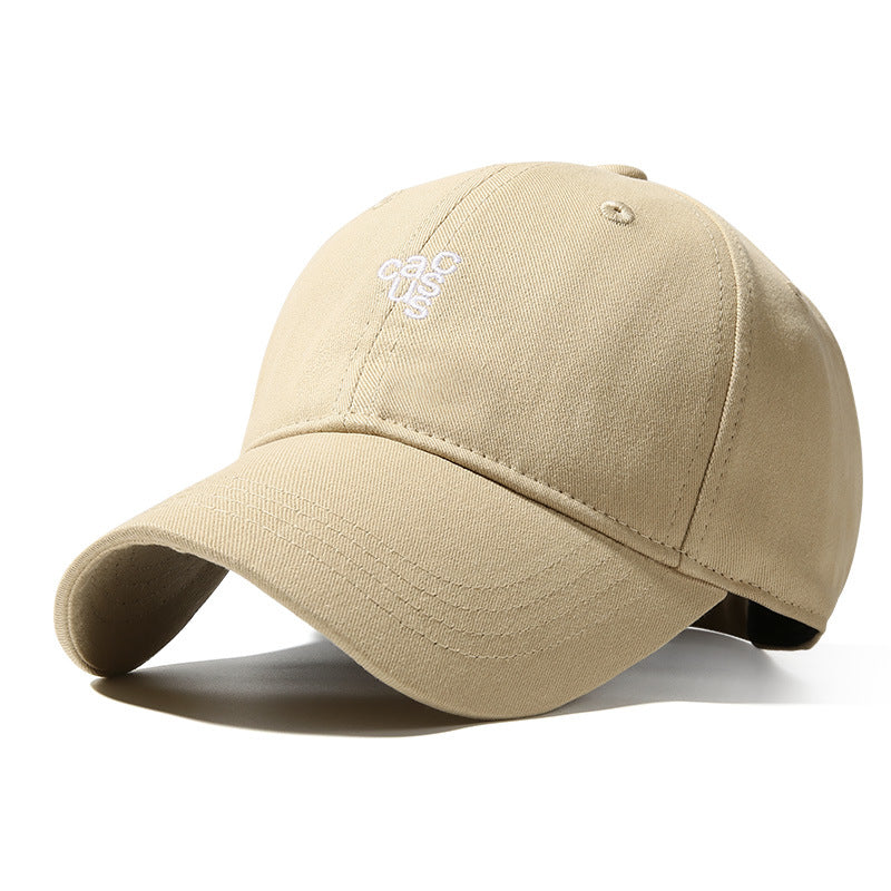 Beige baseball cap with curved brim and white embroidered logo detail.
