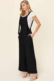 Black textured tie-strap wide-leg maternity jumpsuit with pockets