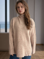 Camel ribbed hemline slit-side turtleneck knit sweater with long sleeves.