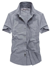 Men's grey short sleeve button-down shirt with pocket and cotton fabric.
