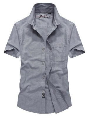 Men's grey short sleeve button-down shirt with pocket and cotton fabric.
