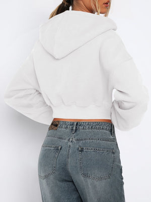 White cropped zip-up hoodie with ribbed hem and hood detail