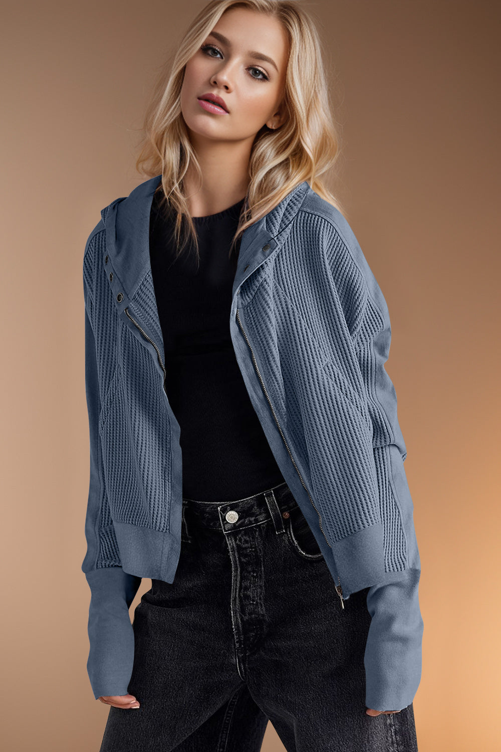 Textured knit bomber hoodie in dusty blue with a zip front and hood.