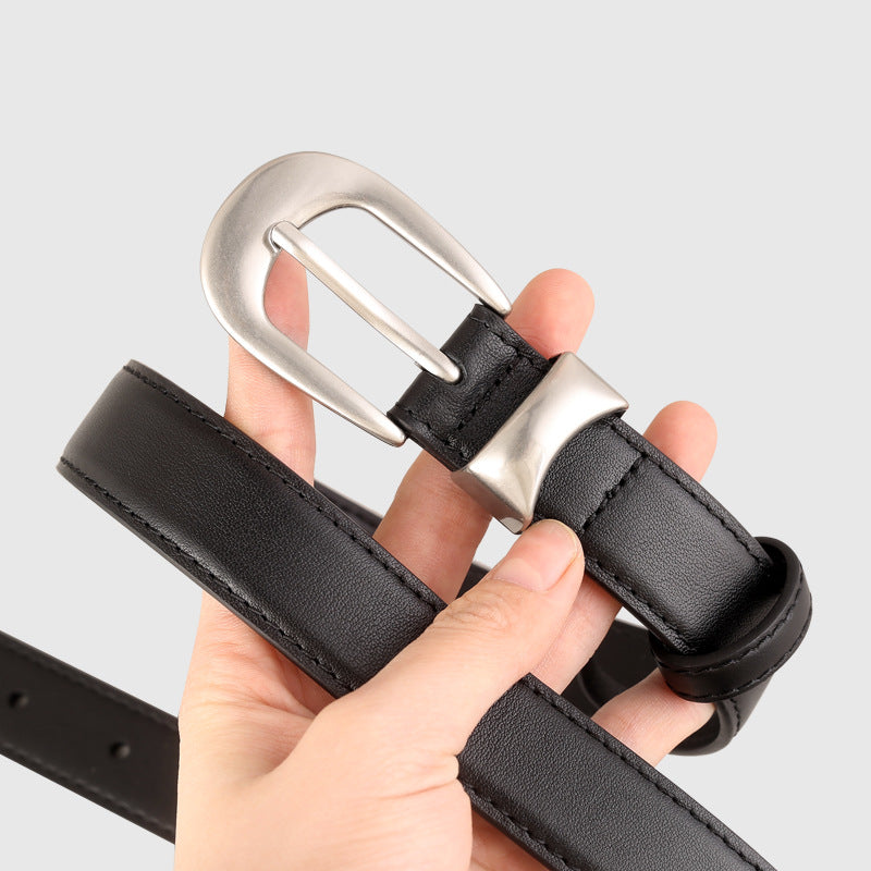 Black leather belt with elegant silver buckle and stitching detail