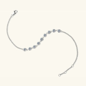 Silver bezel-set moissanite tennis bracelet with adjustable clasp