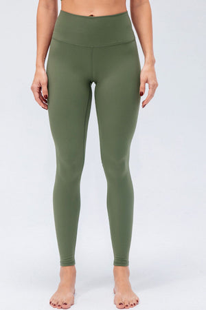 Sculpted Olive High-Rise Performance Leggings with a seamless waistband and full length.