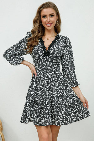 Black floral print mini dress with lace trim V-neck and puff sleeves