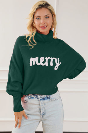 Green acrylic turtleneck sweater with white "merry" graphic and dolman sleeves.