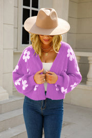 Purple fuzzy cropped cardigan with white floral pattern, open front, long sleeves