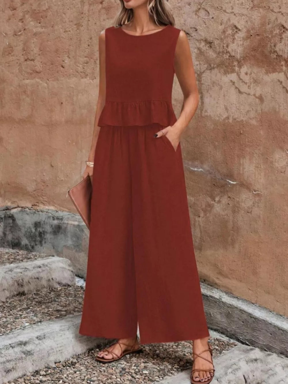 Burgundy ruffled peplum top and wide-leg pants set with pockets.