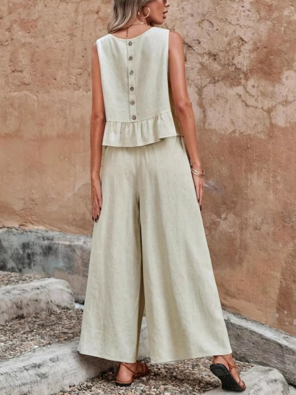 Beige ruffled peplum top with button back and wide-leg pants set