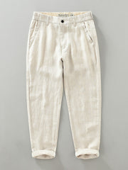 Men's raw hemp color linen cropped sweatpants with elastic waistband and cuffed hems.