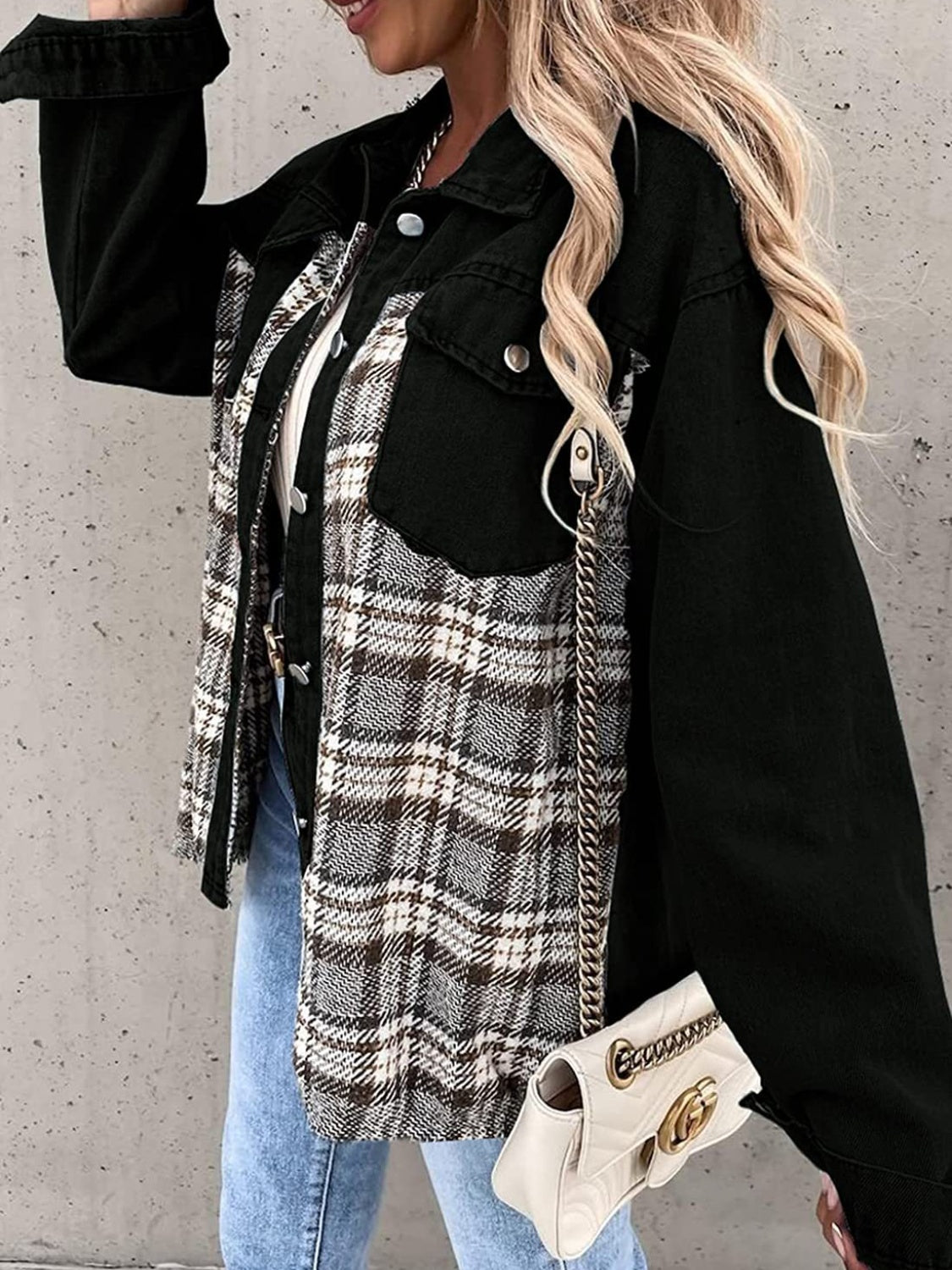 Panelled plaid denim hybrid jacket in black with button details and a chain strap detail.