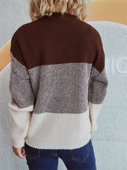 Colorblock textured knit pullover sweater in brown, cream, and grey.
