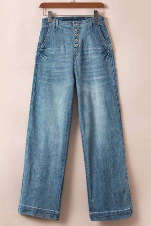 Button-fly wide-leg denim trousers in medium wash with a high rise and buttoned closure.
