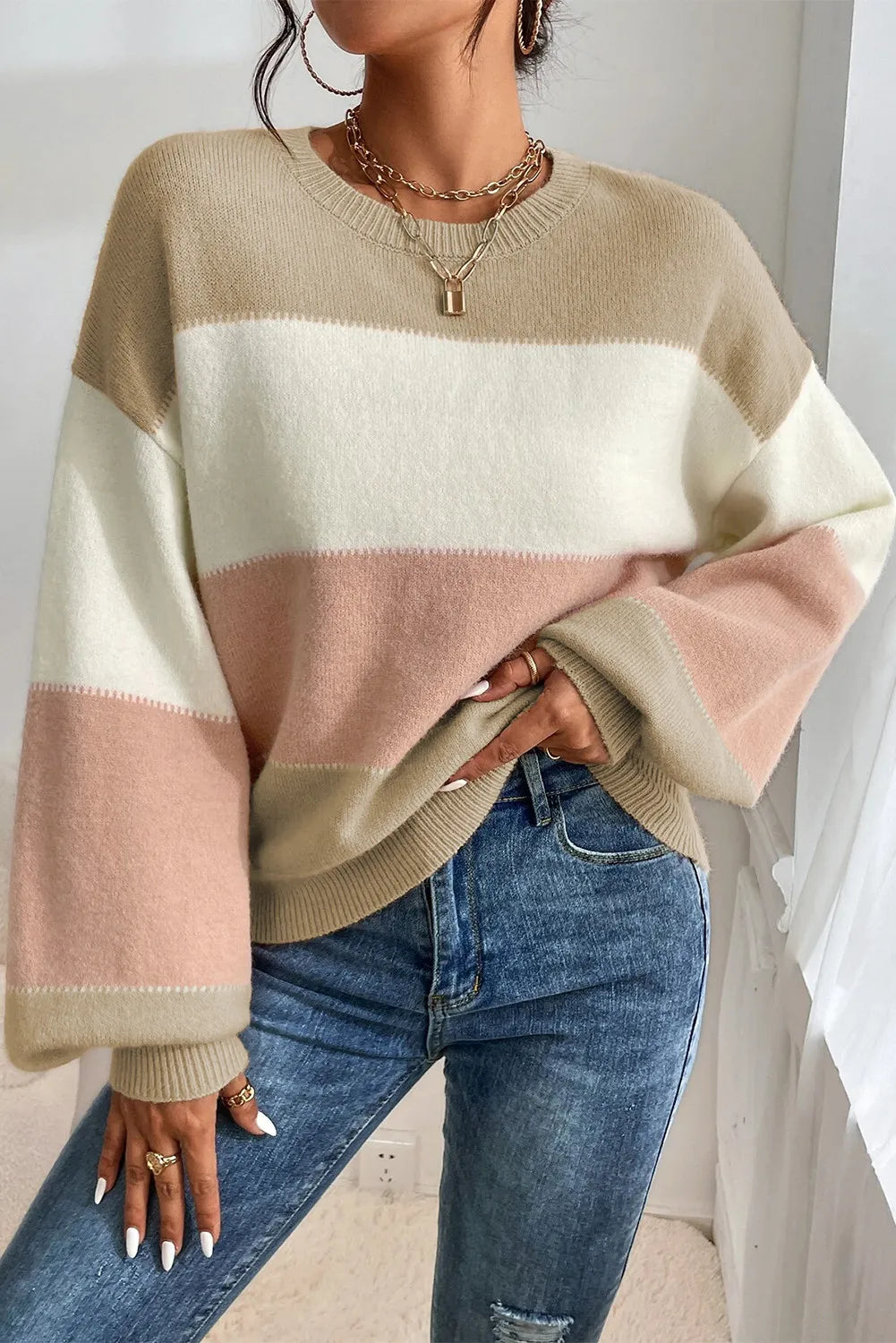 Chic contrast stripe sweater in khaki with lantern sleeves and crew neck.