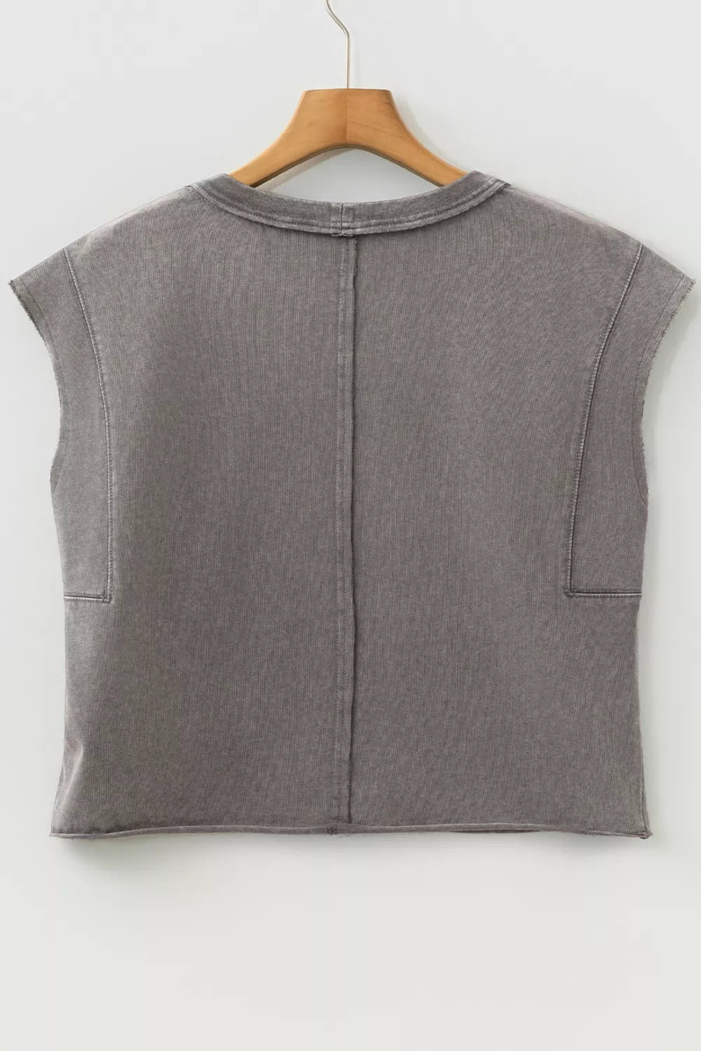 Relaxed mineral wash cotton tank top with raw hem and crew neck.