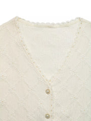 Textured apricot button-up maternity shirt with lace trim and pearl buttons.