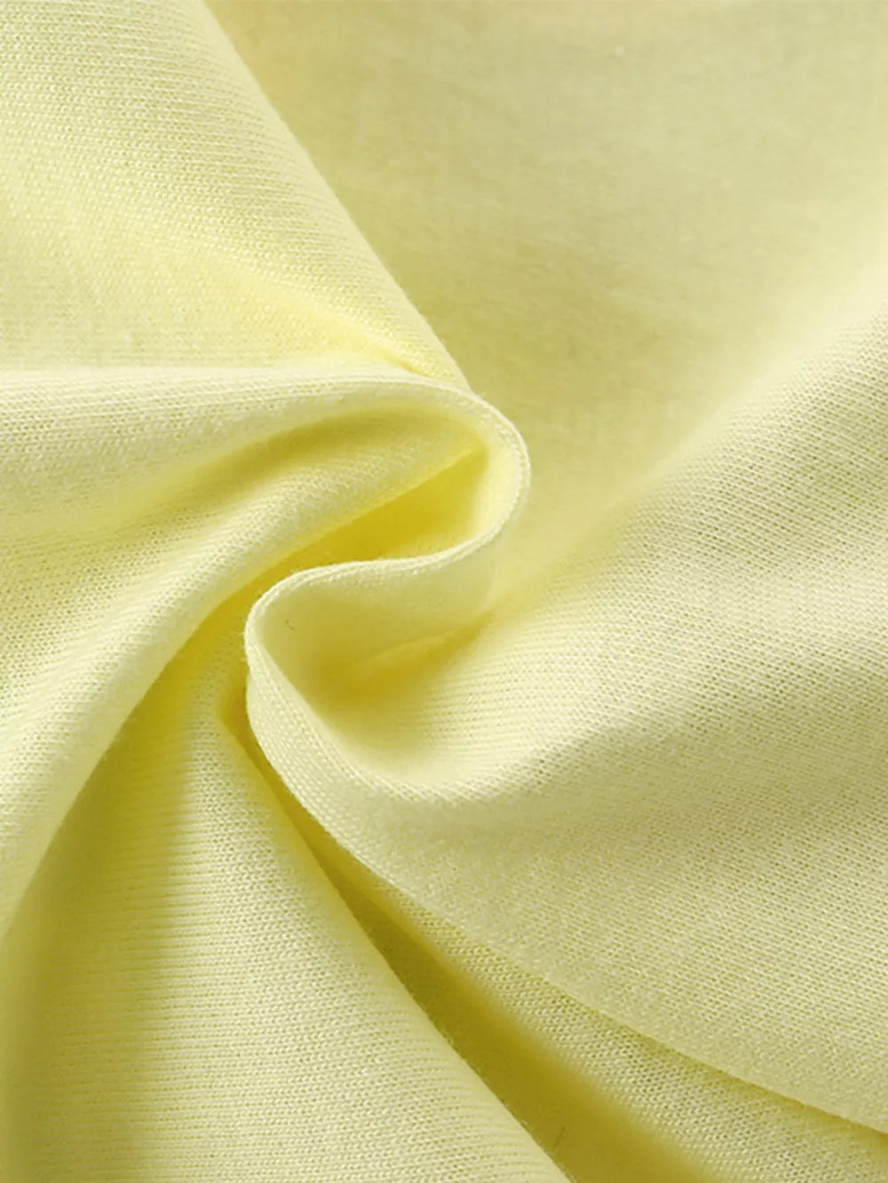 Pale yellow cotton blend baby t-shirt fabric detail