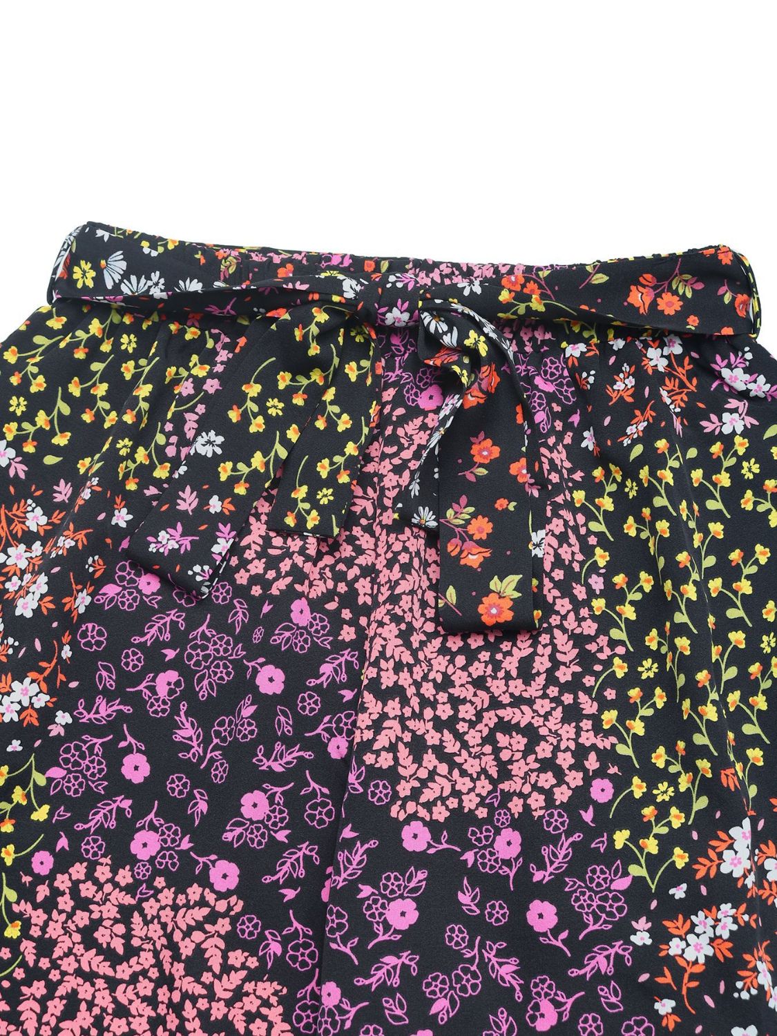 Floral panel palazzo trousers in black with a tie waist and mixed floral prints.