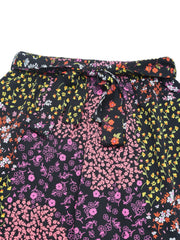 Floral panel palazzo trousers in black with a tie waist and mixed floral prints.