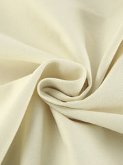 Chic cotton midi skirt in beige with a visible slit detail and subtle ribbed texture.