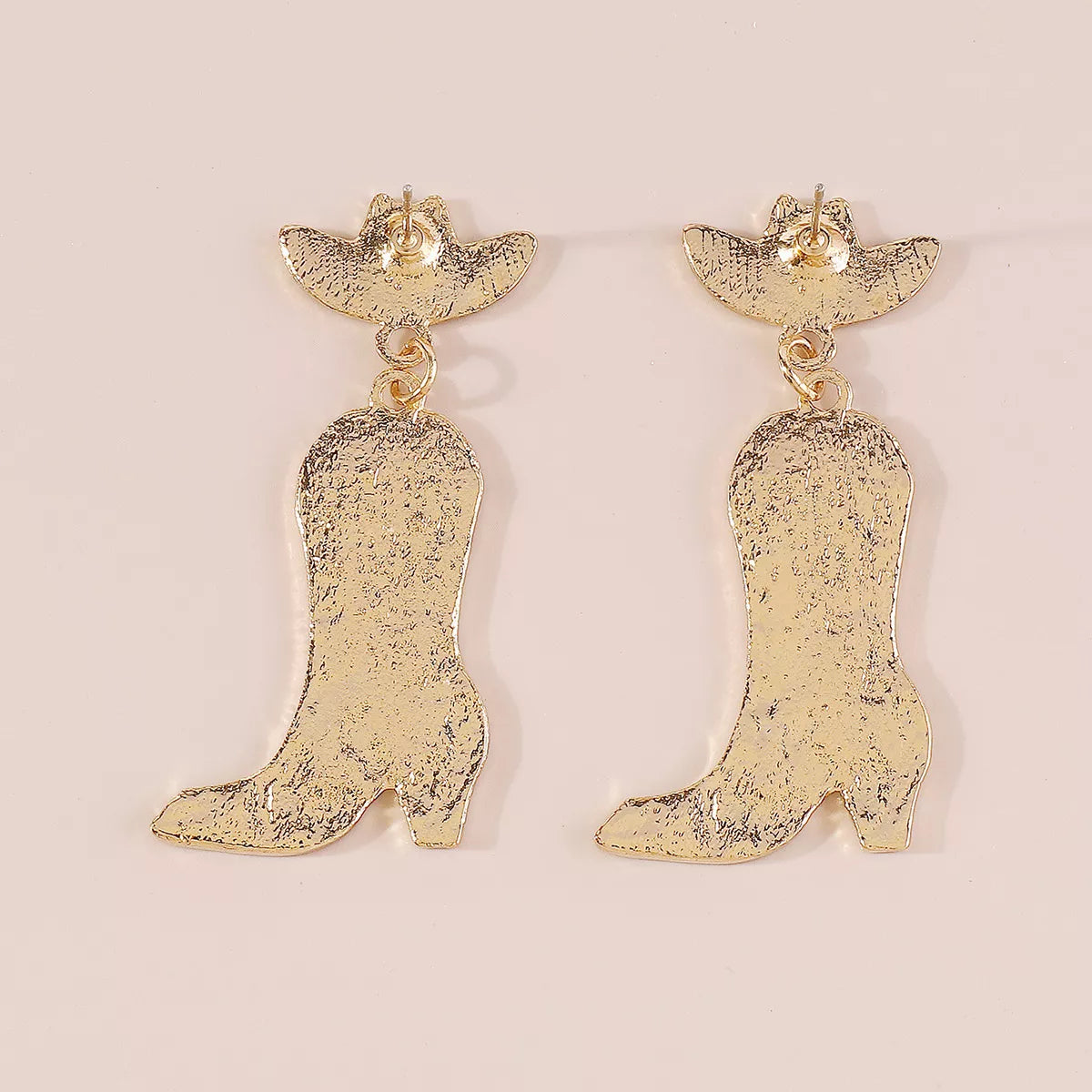 Cowboy boot dangle earrings in gold-plated metal with cowboy hat tops.