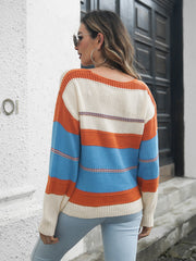 Colorblock knit V-neck pullover sweater in Azure with orange and cream stripes.