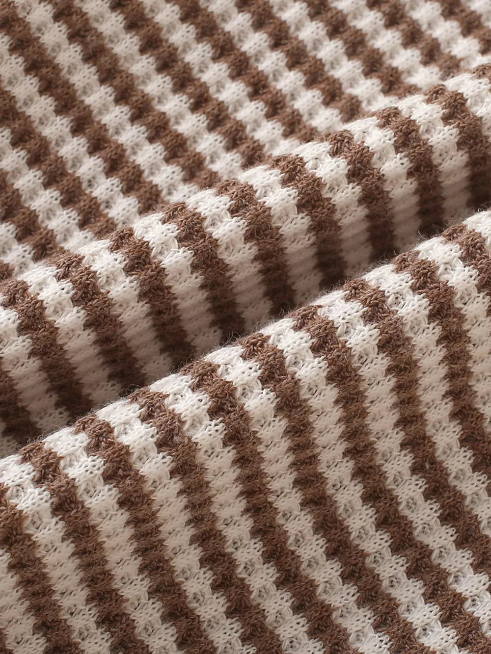 Cozy knit baby set in light brown and white stripes, waffle texture.