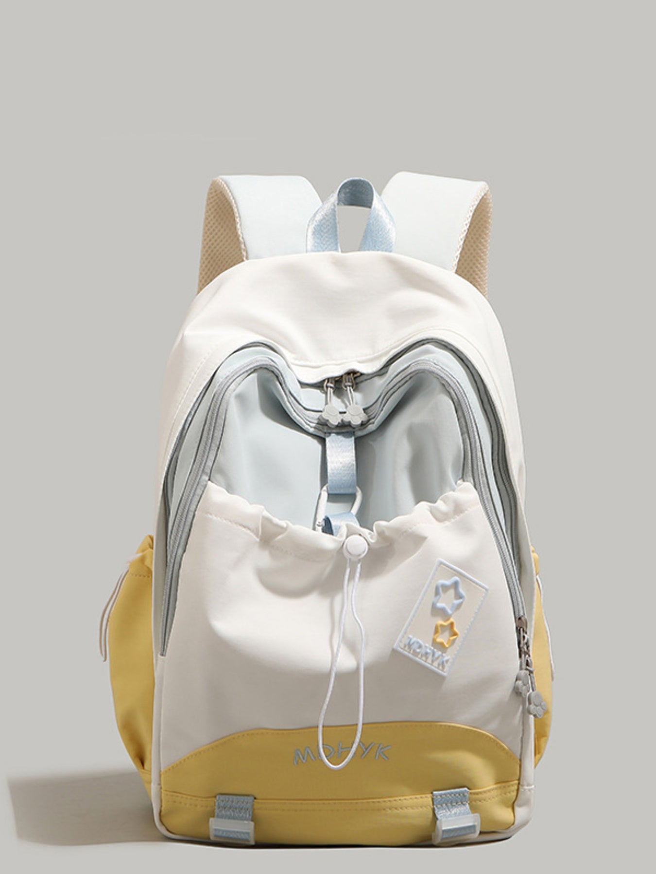 Nylon drawstring backpack with multiple pockets, featuring yellow and cream color blocking and star patches.