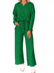 Green V-neck textured lounge set with diagonal pattern, long sleeves, and wide-leg pants.
