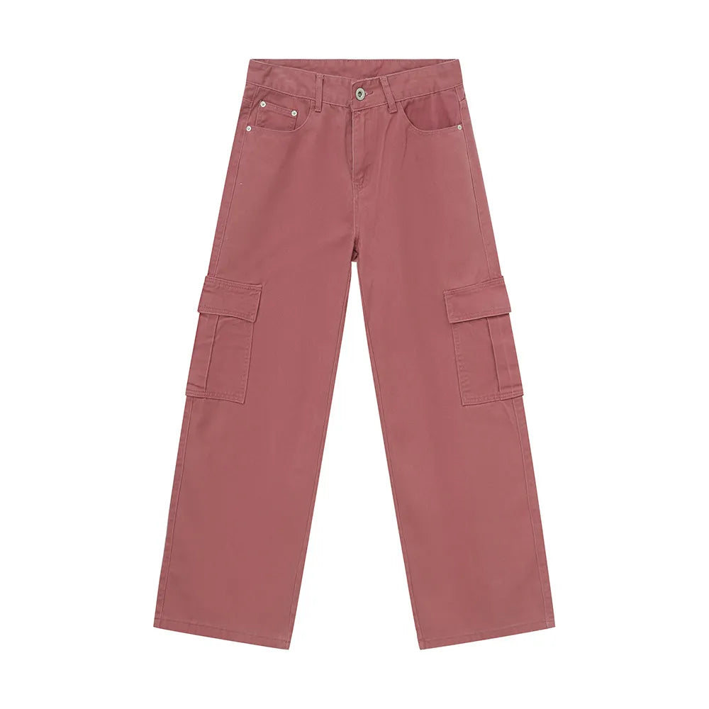 Oversized cargo denim trousers in dusty pink with large side pockets and a relaxed fit.