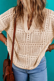 Tan open-knit Johnny collar pullover sweater with a V-neck and detailed stitching.