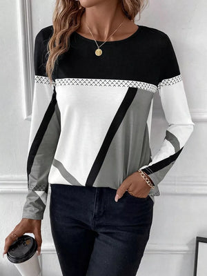 Geometric panel long sleeve t-shirt in black, white, and gray with chevron detail.