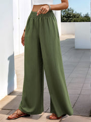 Moss green textured elastic waist palazzo trousers with a wide leg