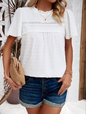 White dotted swiss smocked bodice flutter sleeve blouse with lace trim