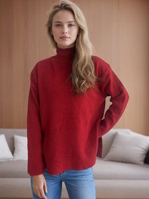 Scarlet ribbed turtleneck sweater with slit sides and a textured knit.