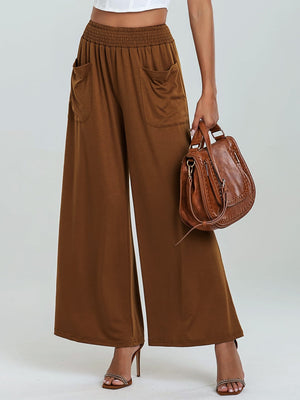 Caramel elastic waist palazzo trousers with pockets and wide legs.