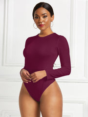 Burgundy ribbed jersey bodysuit with long sleeves and crew neck.